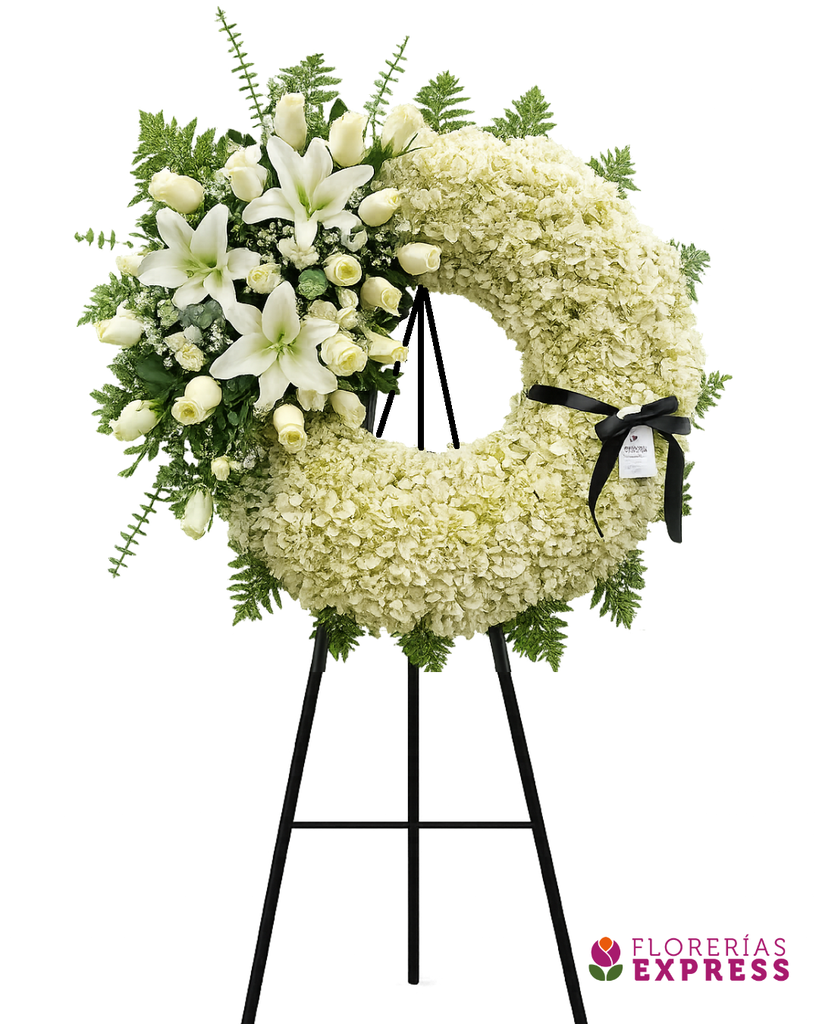 Corona grande c/ moña costado tonos blancos.